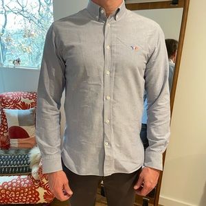 Light blue button up shirt by Maison Kitsune